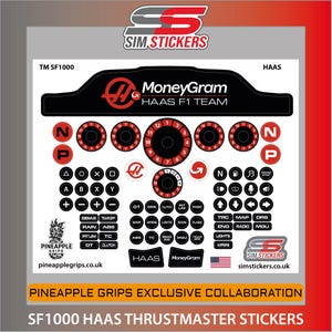 May include: SF1000 Haas Thrustmaster sticker sheet. The stickers display the MoneyGram Haas F1 Team logo, dials, buttons, and text labels. The design includes the Pineapple Grips logo and simstickers.co.uk.