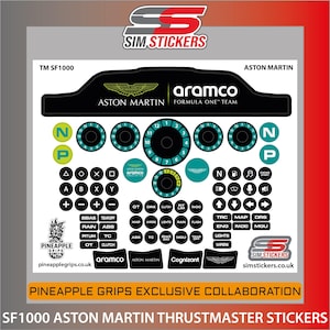 May include: A sheet of SF1000 Aston Martin Thrustmaster stickers. The stickers feature the Aston Martin logo, Aramco branding, and various control labels in black, teal, and white. Includes logos for Pineapple Grips and Sim Stickers.