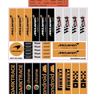 May include: A sheet of various stickers featuring racing team logos and sponsor brands. Includes "McLaren" in orange and black, "West" in white and black, and other brand names like "Darktrace", "Chrome", "Android", "Irelli", and "Makita".