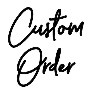 May include: Black cursive text on a white background reads "Custom Order". The words are in a stylish, handwritten font, with the letters connected. The image is simple and clean, with a focus on the text.