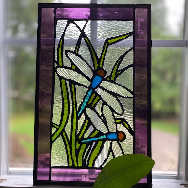 Stained glass dragonflies in the grass, original design.  Bright beautiful colors. Window hanging, glass art.