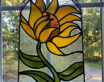 Stained glass sunflower created for fall, vibrant colors, custom.