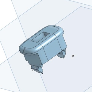 May include: A light blue, 3D-modeled plastic component with a rectangular opening and rounded edges. The component has two small protrusions on the bottom and is set against a backdrop of intersecting light blue planes.