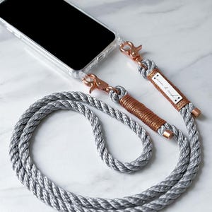 Mobiele telefoonketting "Glizzy" met roségouden karabijnhaak en glitter