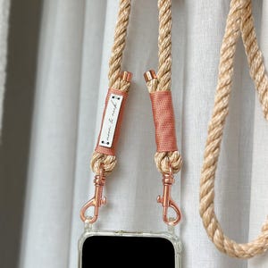 Bracelet interchangeable en chaîne pour téléphone portable avec mousqueton en or rose et étui transparent pour téléphone portable