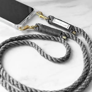 Chaîne de téléphone portable grise cordon interchangeable avec étui de téléphone portable transparent avec œillets pour iPhone, Samsung, Huawai, Xiaomi