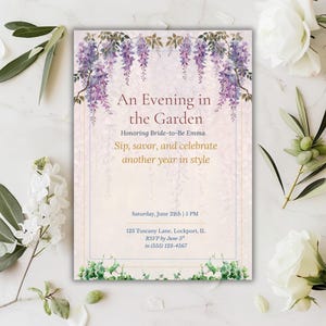May include: An invitation with the text "An Evening in the Garden" and floral accents. The invitation features purple wisteria and green foliage. The text includes the date, time, and location for an event.