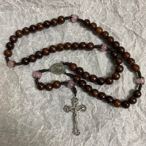 Catholic Rosary featuring black wooden beads and pink gemstone accents, Wood Bead rosary, Pardon Crucifix Rosary, Cord Rosary,Rosary for Her