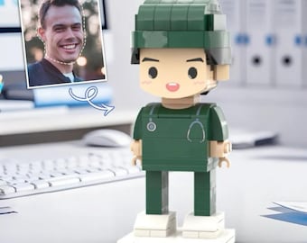 Personalized building block figure with a custom head in a green doctor's outfit – a special gift for Doctors' Day