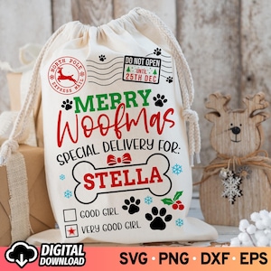 May include: A white Christmas gift bag with a red and green design. The bag has a red and green bow and the text "Merry Woofmas Special Delivery for: Stella Good Girl Very Good Girl".
