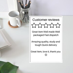 K&ouml;nnte beinhalten: Ein wei&szlig; gerahmtes Schild mit schwarzem Text, der "Customer reviews" lautet und f&uuml;nf schwarze Sterne enth&auml;lt. Der Text unter den Sternen lautet "Great item Well made Well packaged Fast dispatch Amazing quality, study and tough Quick delivery Great item, love it, thank you".