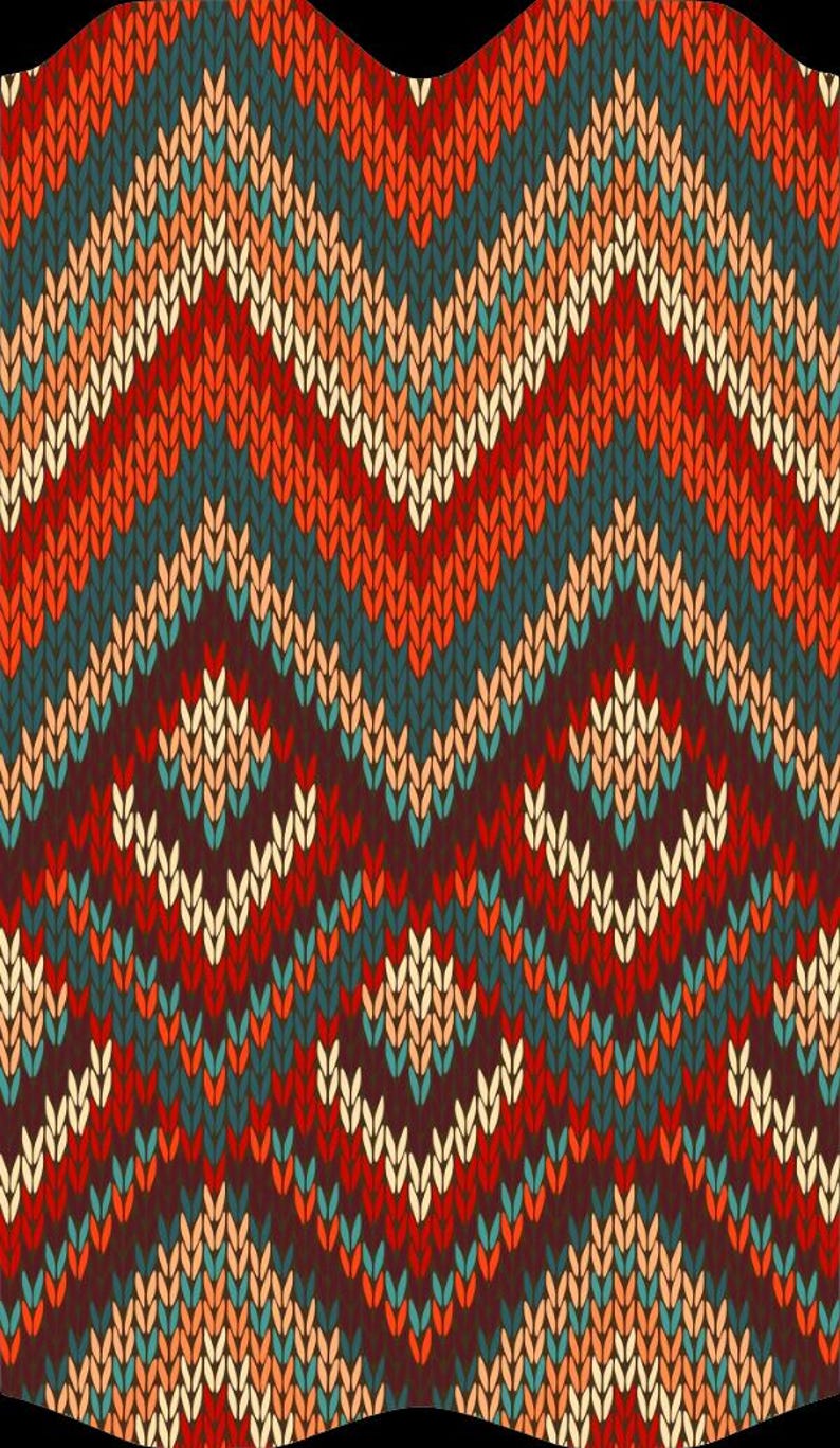 May include: A close-up of a knitted pattern with a repeating chevron design. The pattern features a mix of colours, including red, orange, teal, cream, and brown, creating a textured and visually appealing textile.