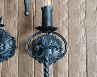 Hand forged metal single wall lamp. 1920S style Spanish Revival home. light