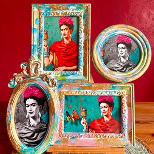 May include: A multi-frame picture frame with a distressed turquoise and gold finish. The frame holds four images of Frida Kahlo, each with a different background and a butterfly.