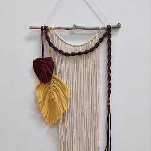 Macramé Wall Hanging with Maroon and Mustard feathers, Mookaite Jasper beads on drift wood