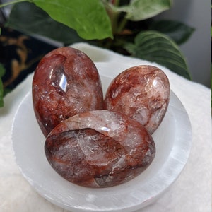 Fire quartz palm stones - full range of clear and pale to dark and rainbows - different sizes