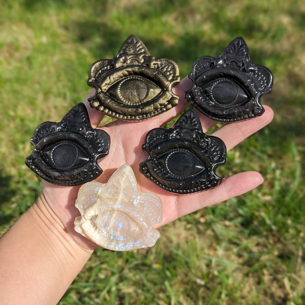 Evil eye crystal carving - moonstone, gold sheen obsidian, silver sheen obsidian