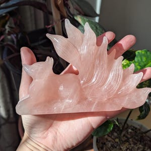 Rose quartz nine tailed fox carving