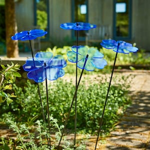 Set of 5 Double Blossom, 5 colour choice, 75cm, 29.5 inch  high, 15cm, 5.9 inch diameter. SunCatchers work without battery, drawing natural UV light, emitting glow at edges. Glowing dawn to dusk. Image shows 5 yellow Double Blossoms