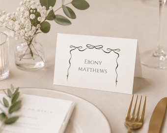 Plantilla de tarjetas de mesa para bodas con lazo / Tarjetas de nombre con detalles de lazo editables / Tarjetas de mesa para bodas en Canva / Tarjetas de mesa para bodas imprimibles