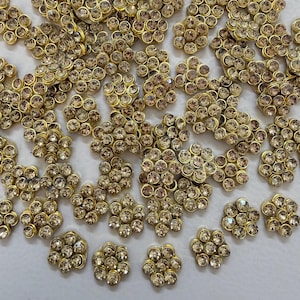 25 parches de flores de cristal con bisel dorado y apliques de diamantes de imitación para zapatos, bolsos y manualidades de costura.