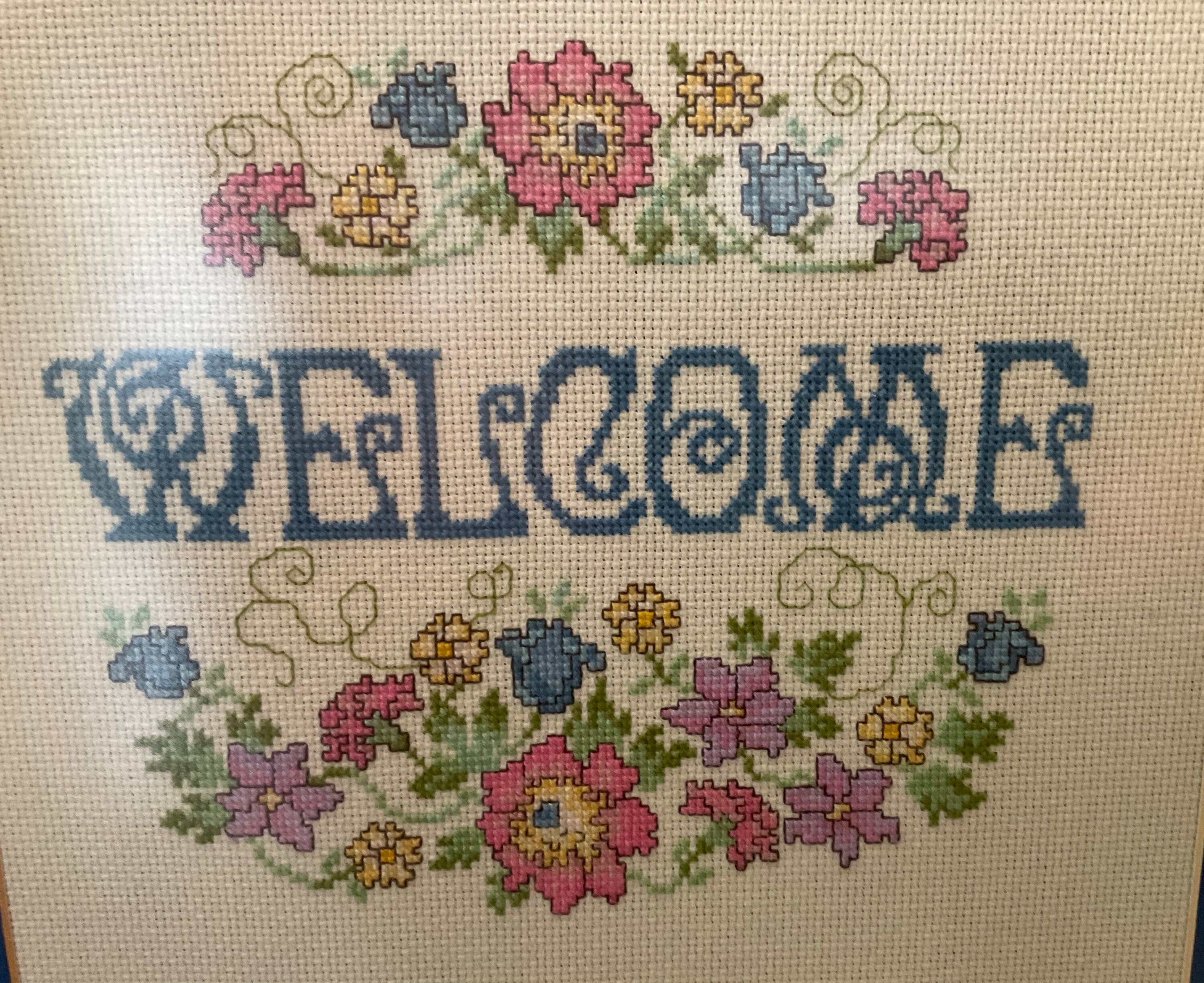 Cross stitched framed with non reflective glass. Etsy