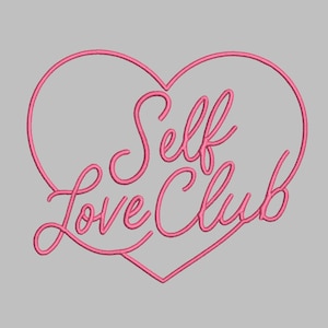 May include: A pink embroidered heart design with the words "Self Love Club" in a cursive font. The design is set against a light grey backdrop. The heart outline and text are in a vibrant pink colour.