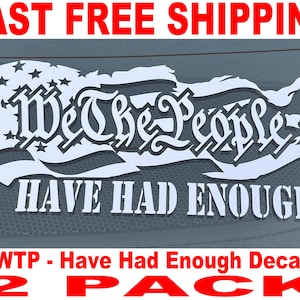 May include: Two white vinyl decals with an American flag design and the text "We The People Have Had Enough".