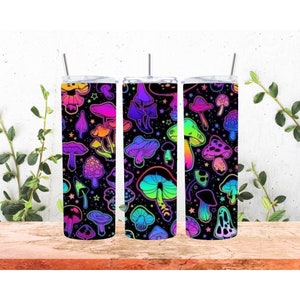 May include: Three stainless steel tumblers with a black background and a rainbow colored mushroom pattern.
