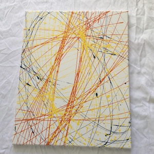 May include: Abstract painting on canvas with a white background and a chaotic pattern of orange, yellow, and blue lines.