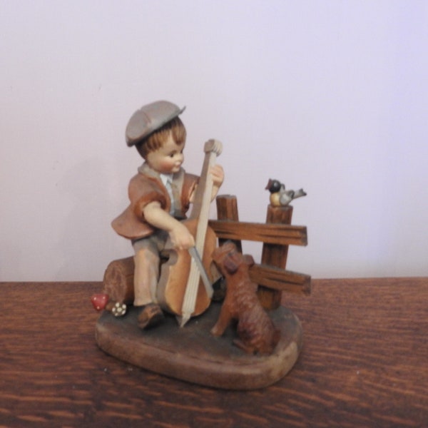 Anri Carved Wood Little Boy Playing a Cello and Dog Figurine