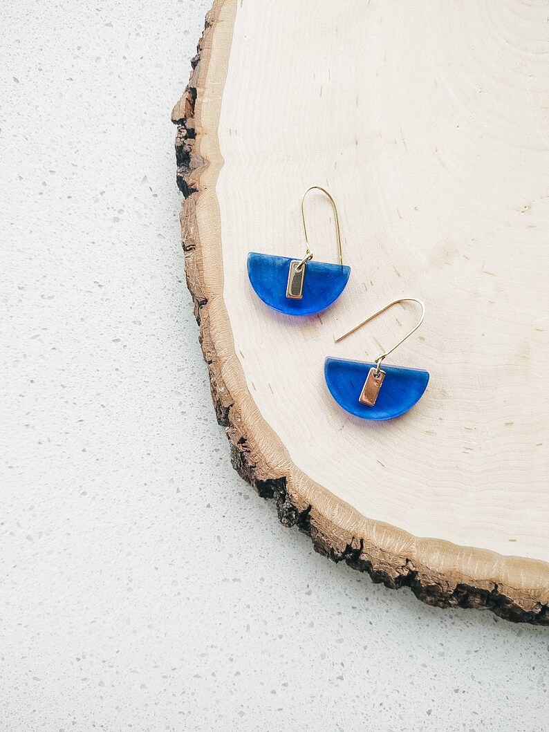 Cobalt blue dangles with gold accents