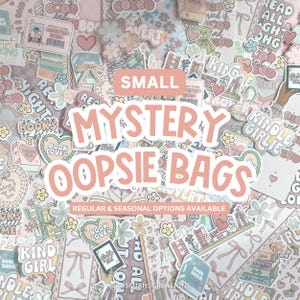 May include: A collection of stickers with a light pink background. The stickers have a book theme, with text that says "Book Lover", "Kindle Girlie", and "Mystery Oopsie Bags". The text "Small Mystery Oopsie Bags" is in a large, pink font.