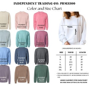 May include: Color and size chart for unisex garment-dyed sweatshirts. The chart displays various colors, including ivory, dusty pink, and sage. Measurements are in inches, with sizes ranging from S to 3XL. The sweatshirts are 80% ring-spun cotton and 20% polyester.