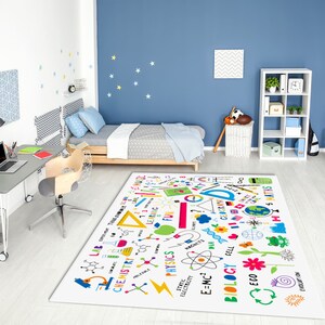 May include: A white rug with colorful illustrations of science and math concepts, including a globe, a triangle, a compass, a beaker, a microscope, and the words "Biology", "Chemistry", "Physics", "Math", and "Eco".