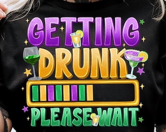 May include: Black t-shirt with a green, purple, and gold design that says "Getting Drunk Please Wait" with a progress bar and images of cocktails.