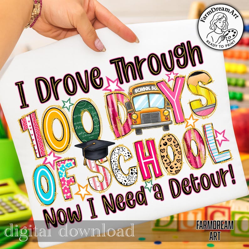 May include: White t-shirt with the text "I Drove Through 100 Days of School Now I Need a Detour!" in various colors and fonts. The design includes a school bus, stars, and a graduation cap. The words "digital download" are also present.