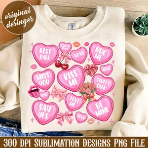 May include: A sublimation design featuring a white sweatshirt with pink hearts and text. The hearts have various Valentine's Day themed phrases like "Best Day", "Hug Me", "Kiss Me", and "Sweet Talk".