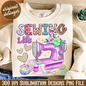 May include: A sublimation design featuring a sewing machine with pink and purple accents, surrounded by hearts, flowers, and a measuring tape. The text "Sewing Life" is displayed above the machine in colorful letters with various patterns.