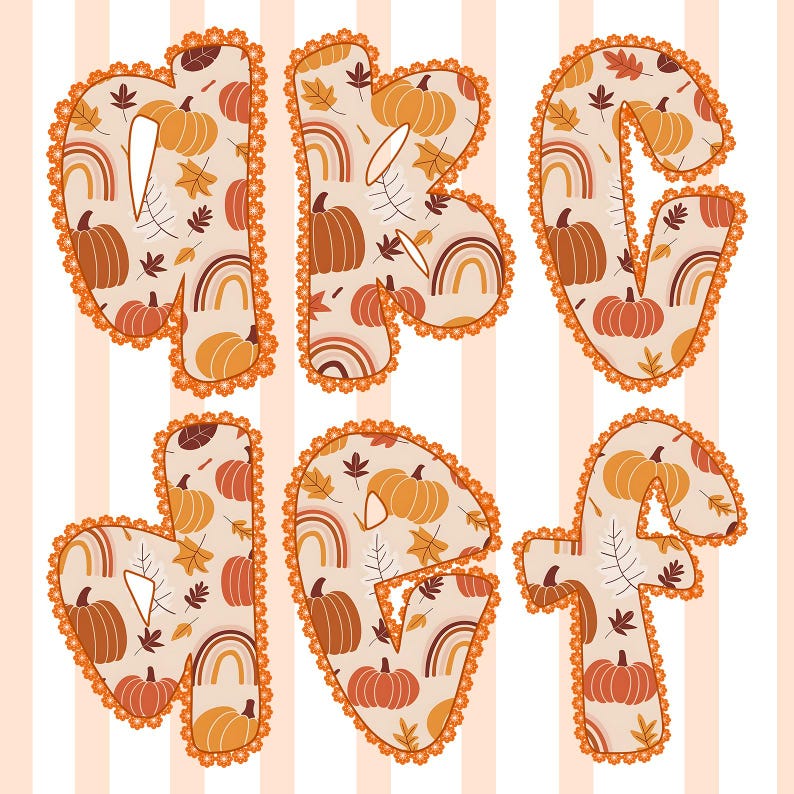 May include: Decorative fall-themed letters in a whimsical style. Each letter is filled with a pattern of pumpkins, rainbows, and leaves in shades of orange, brown, and cream. The letters are outlined with a decorative orange lace trim.