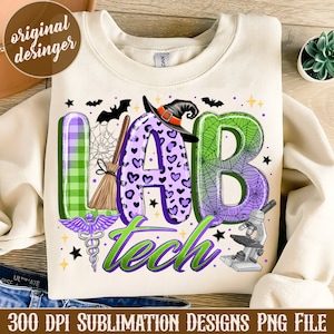 May include: Cream-colored sweatshirt with a colorful "LAB tech" design. The design features a witch hat, bats, a broom, and a microscope. The letters "LAB" are purple and green, with a plaid pattern and heart accents. The text "300 DPI SUBLIMATION DESIGNS PNG FILE" is at the bottom.