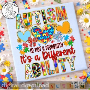 Op de afbeelding: Lichtblauw T-shirt met het woord "AUTISM" in kleurrijke puzzelstukjes letters. Het shirt heeft een hartvormige puzzel, de tekst "IS NOT A DISABILITY It's a Different ABILITY" en andere puzzelstukjes. Het ontwerp bevat zonnebloemen en strikken.