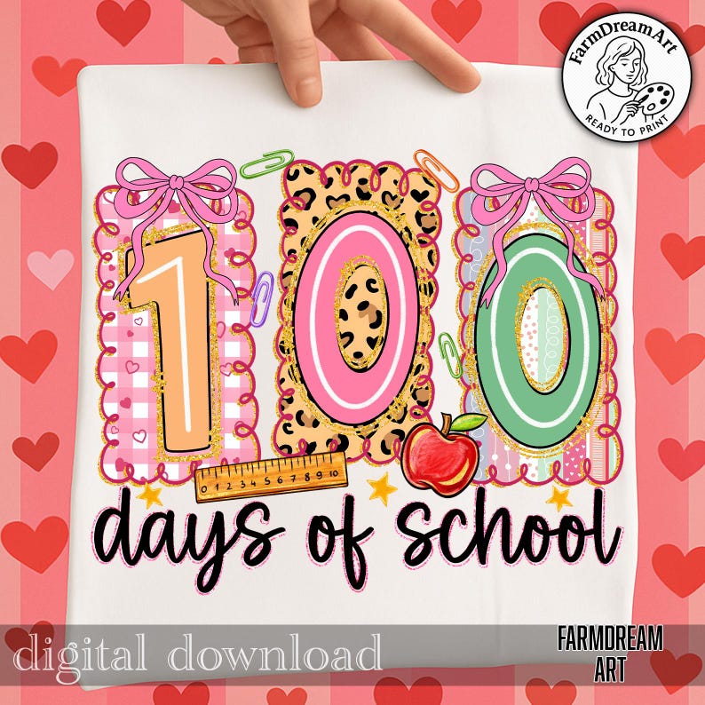 May include: White t-shirt featuring a colourful "100 days of school" design. The design includes the numbers 1, 0, and 0 in various patterns, a red apple, and the text "days of school". The words "digital download" are at the bottom.