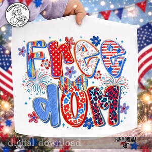 May include: White graphic featuring the words "Freedom Mom" in red, white, and blue, with floral and firework accents. The design incorporates stars, stripes, and a bow, evoking a patriotic theme. The words "digital download" are at the bottom.
