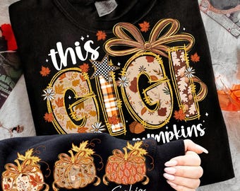 May include: Black sweatshirt with the text "this Gigi loves pumpkins" in white and gold lettering. The word "Gigi" is decorated with fall leaves and flowers. The sleeve features three pumpkin designs with names.
