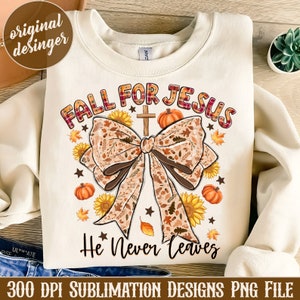 May include: A white sweatshirt with a fall-themed design featuring a bow with a cross, pumpkins, sunflowers, and the text "Fall for Jesus He Never Leaves".