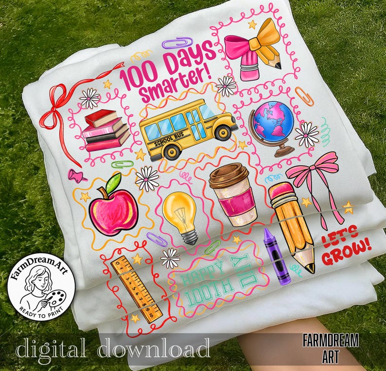 May include: White t-shirts with colorful school-themed graphics. Designs include a school bus, apple, globe, pencils, and the text "100 Days Smarter!" and "Let's Grow!" The shirts are stacked on a green grassy surface.