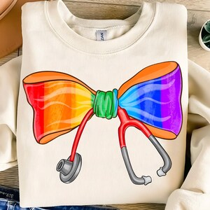 LGBTQ Nurse Coquette Bow Png,Pride Nurse Sublimation,Rainbow Nurse Png,LGBTQ Healthcare Worker PNG,Stethoscope Bow Png,Pride Medical Png