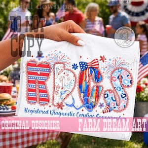 May include: A white t-shirt featuring a graphic design with the letters RDCS in a patriotic theme. The letters are decorated with red, white, and blue patterns, stars, stripes, and leopard print. A blue stethoscope and fireworks are included.