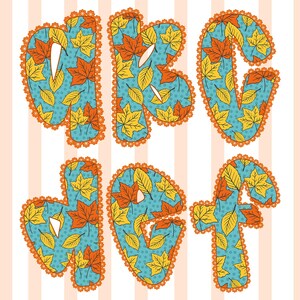 May include: Decorative alphabet letters A, B, C, J, G, and F. Each letter features a teal background with a polka dot pattern and is filled with orange and yellow autumn leaves. The letters are outlined with orange lace.